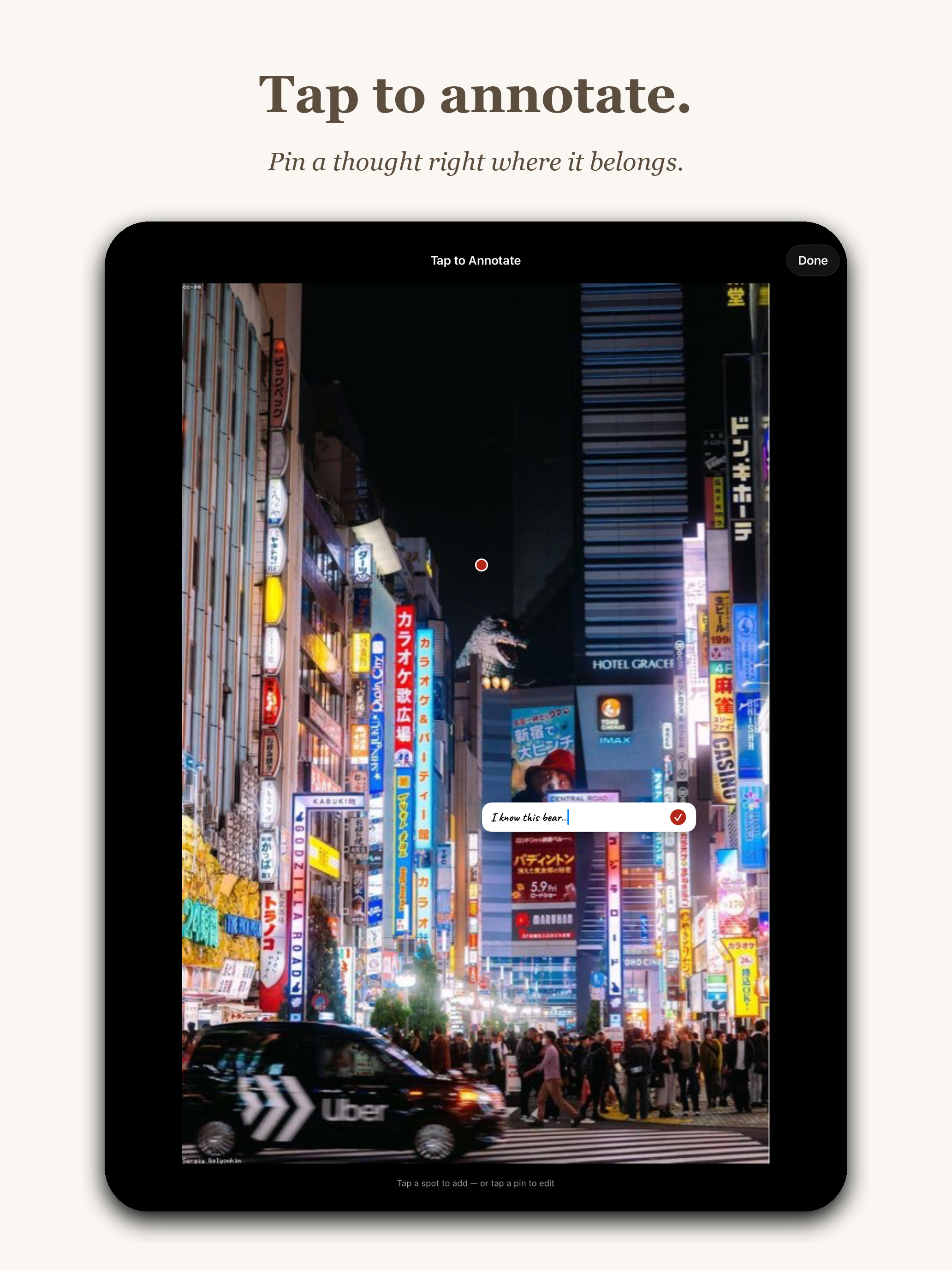App Store marketing screenshot with headline Tap to annotate. and subtitle Pin a thought right where it belongs. Shows an iPad with a full-bleed photo of a neon Tokyo street at night with bright Japanese and English signs. A red pin marker sits on one of the signs and a small text input field reads I know this bear. Header reads Tap to Annotate with a Done button.