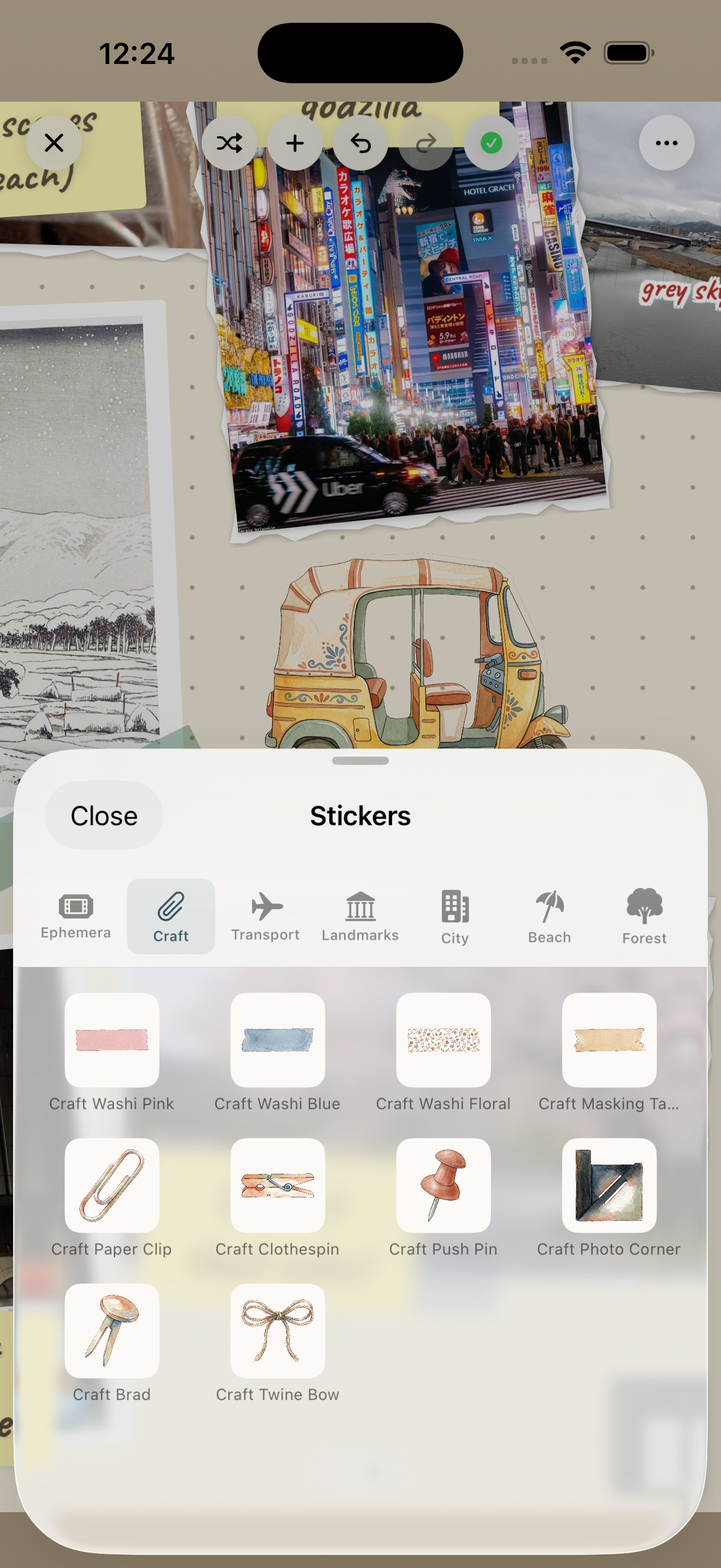 Sticker picker open over the journal canvas